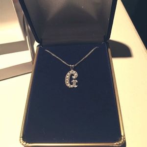 Sterling silver & diamond initial G necklace